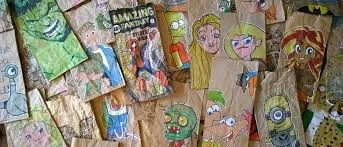 Paper lunch bags with drawings.